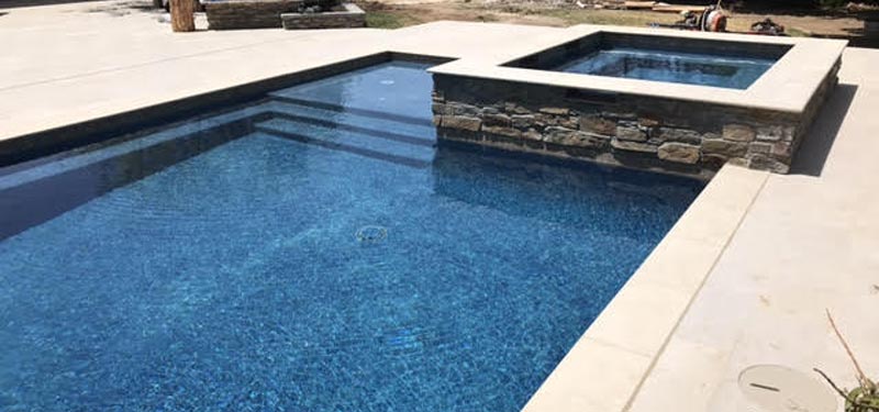 work with a local custom pool builder