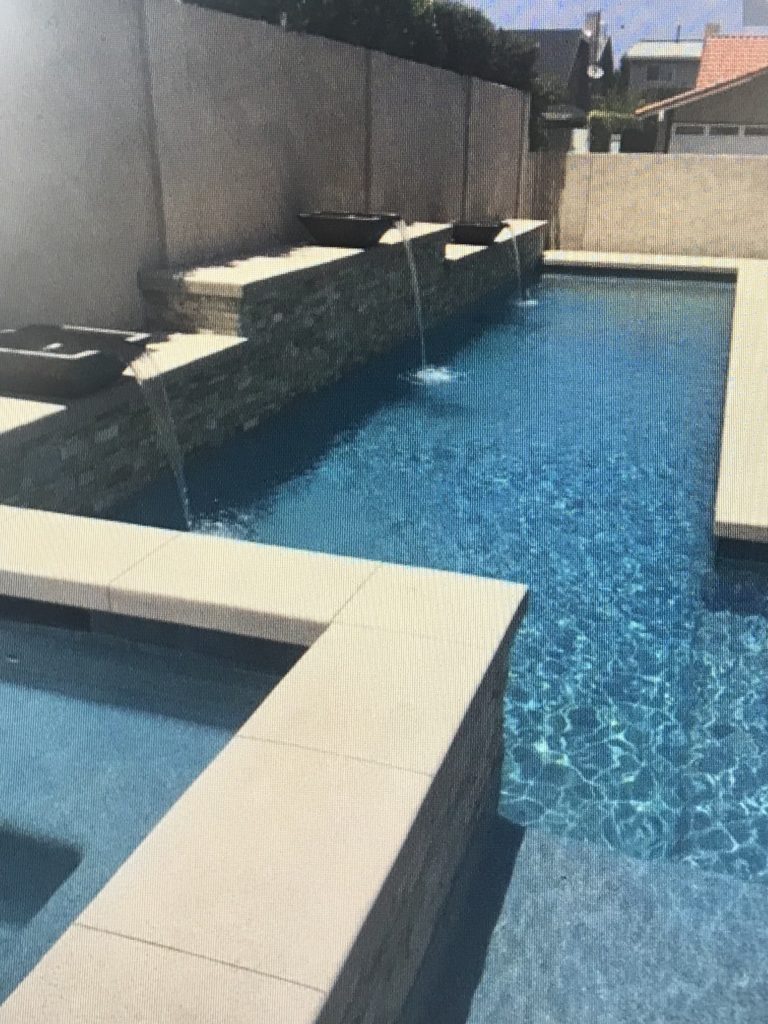 A custom pool with built in waterfalls
