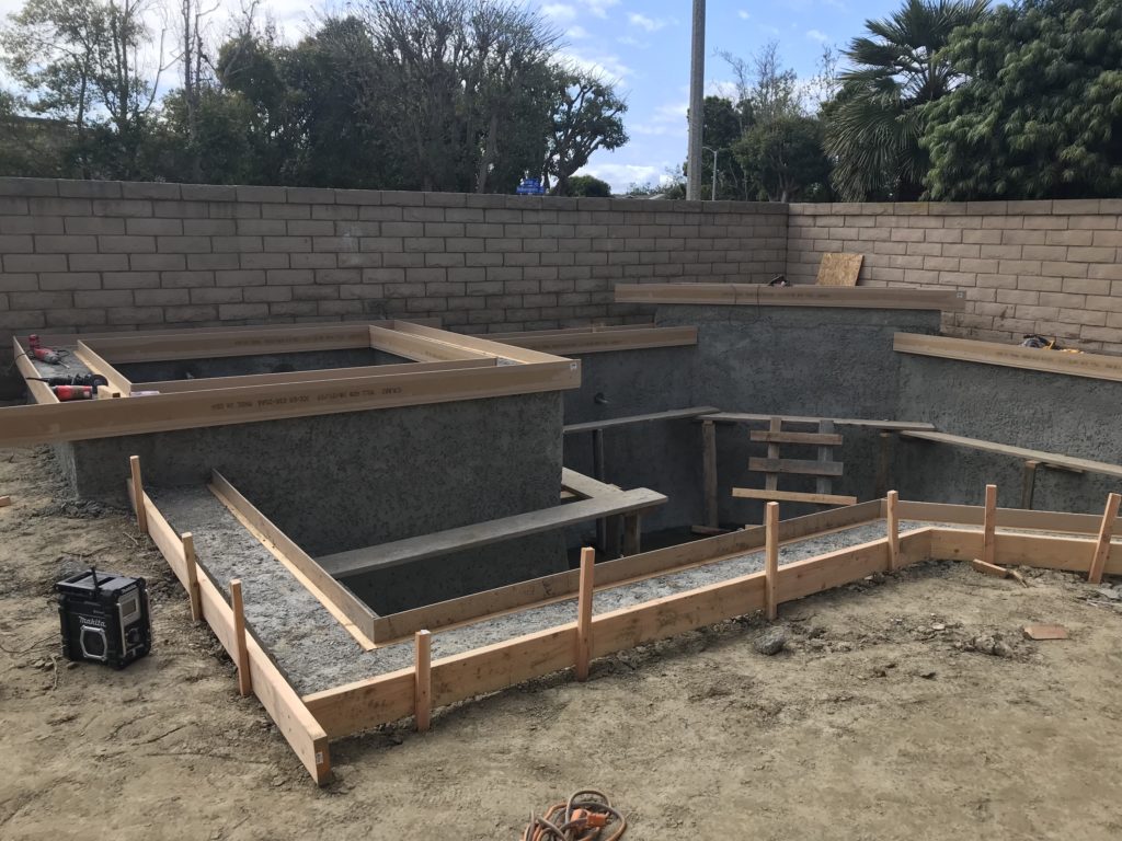 Partial construction of a remodeled pool